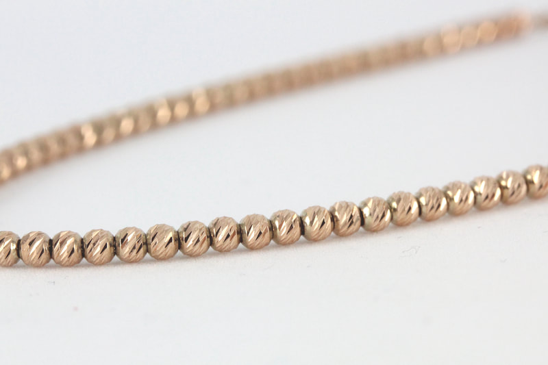 Bright Rose Gold Etched Ball Necklace