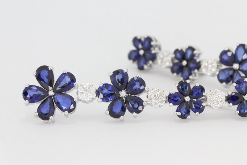 Floral Sapphire and Diamond Drop Earrings in White Gold
